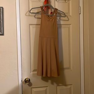 Really pretty tan dress in a size 10 to 12 in children’s